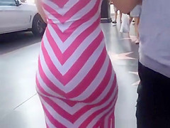 Big ass woman in tight white and pink dress