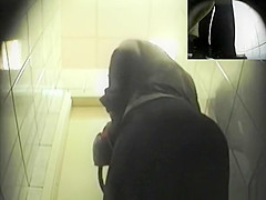 Big ass woman spied peeing