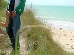 Couple play at the beach