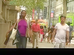 Ebony girl in purple top wearing no bra