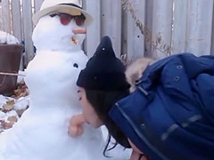 fuck snowman in the yard of house