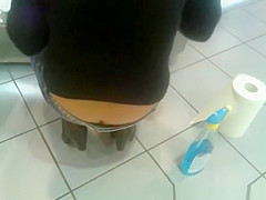 Girl in shorts cleanig glass