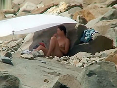 NUDIST COUPLES ON BEACH