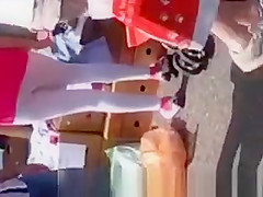 White leggings woman in flea market