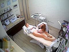 Woman doing depilation on her pussy