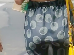 Woman Wearing See Through Dress in the Streets